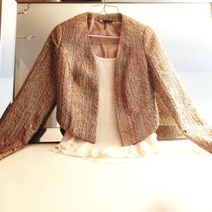 Assymetrical dinner jacket in gold